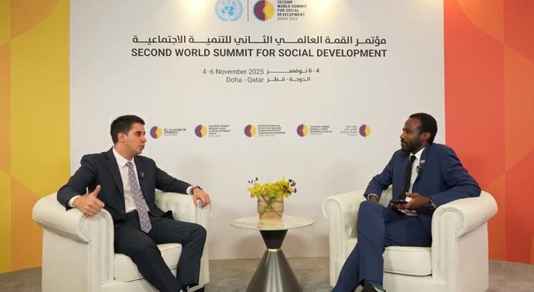 Dr. Philippe Bollier, Assistant Secretary-General for Youth Affairs, speaks to UN News during the Second World Summit for Social Development in Doha, Qatar, on 4-6 November 2025.
