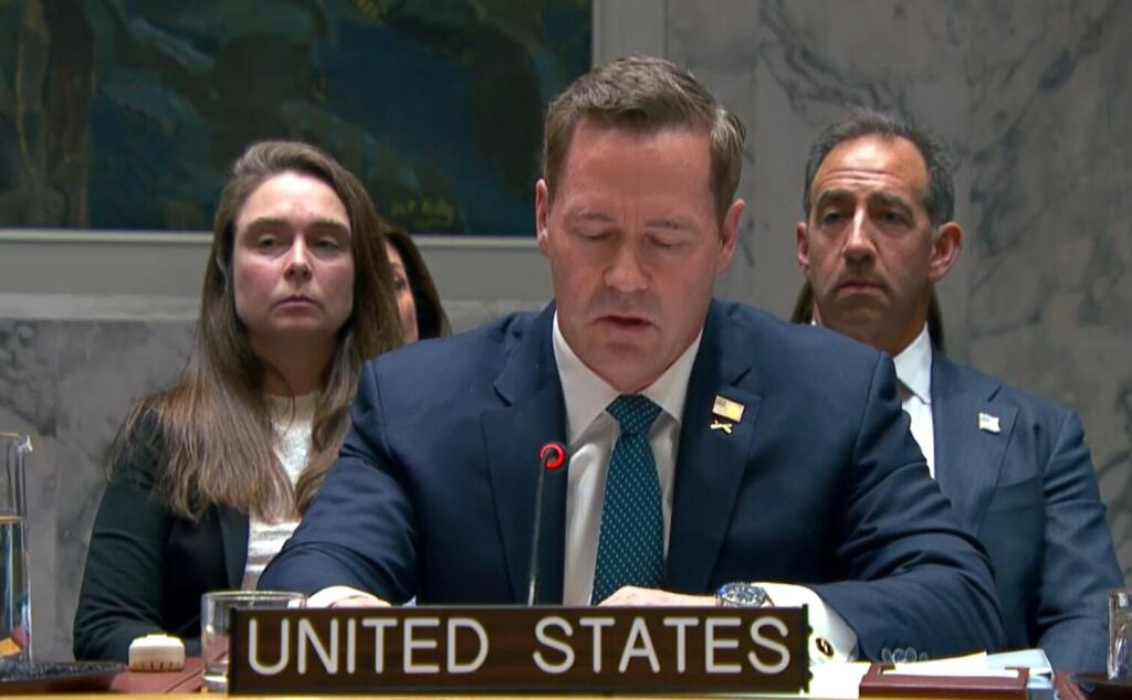 Ambassador Mike Waltz of the United States addresses the Security Council meeting on Iran and the Middle East. A United States government official speaking at a diplomatic meeting, with nameplate reading 'UNITED STATES', flanked by two other officials.
