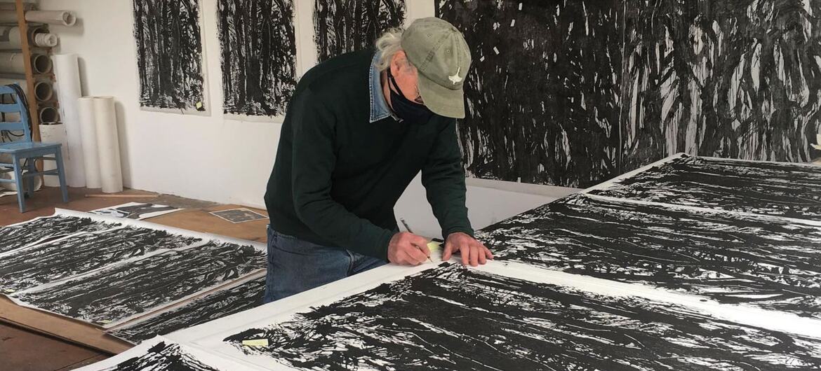 Sandy Walker, an American painter and printmaker, works on large-scale black and white abstract prints in his Oakland studio.
