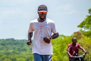 Deo Kato, a migrant born in Uganda and raised in the UK, runs an 8,262-mile route from Cape Town to London to challenge migration stereotypes and promote racial equality.