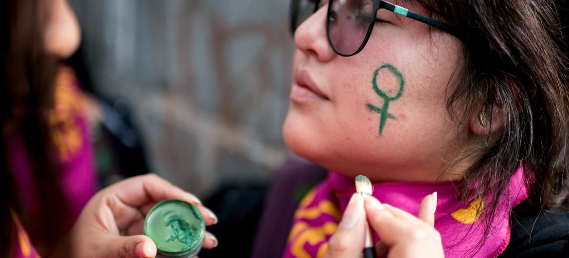 A woman participates in a march against gender violence in Quito, Ecuador.
