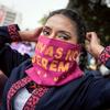 A woman participates in a march against gender violence in Quito, Ecuador.