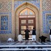 Men pray at a mosque in Afghanistan.