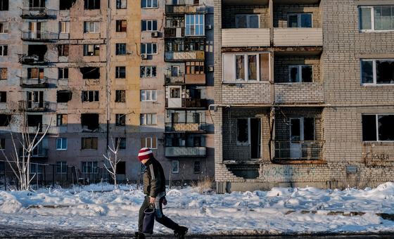 A child walks past a damaged building in eastern Ukraine. (FIle)