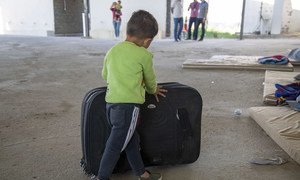 طفل في مركز استقبال في قرية سهل بالعراق، حيث تلقى  182 سوريا مساعدة المنظمة الدولية للهجرة في أكتوبر 2019. 