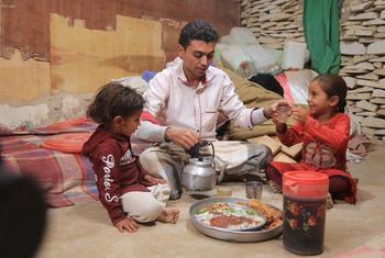 Waleed Al- Ahdal, a simple man who lives in Aljufainah IDPs camp, is preparing the Iftar for him and his kids to break the fasting in Ramadan.