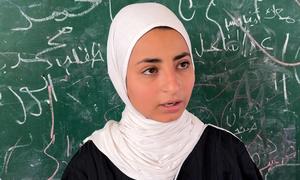 Arwa Al-Masri reside en una escuela de UNRWA en Gaza, junto a más de 20.000 desplazados.