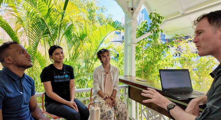 Trinidadian climate activists Joshua Prentice (l), Priyanka Lalla (c) and Zaafia Alexander (r) speak to Conor Lennon from UN News