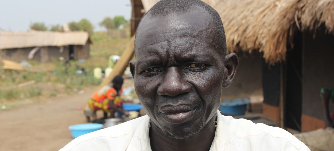 OLWINYI MUGISA now staying at community shelter because of flood at lake Albert Uganda 