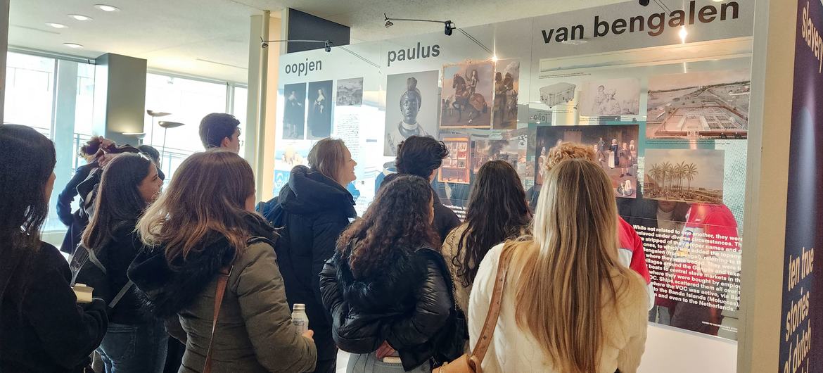 A group of students from Mexico visits the  Ten True Stories exhibition at UN headquarters.