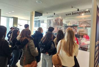 A group of students from Mexico visits the  Ten True Stories exhibition at UN headquarters.