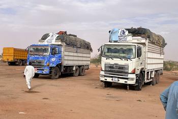 Trucks loaded with humanitarian aid on their way to deliver the supplies to El Fasher, Darfur.