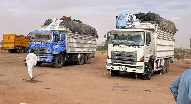 Trucks loaded with humanitarian aid on their way to deliver the supplies to El Fasher, Darfur.