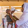 A child is treated for malnutrition at a mobile clinic at a displaced persons site in Mali.