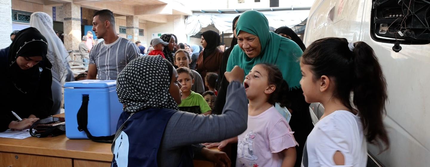 Ferial, a grandmother took her two granddaughters to Deir El Balah health center to get polio vaccination.