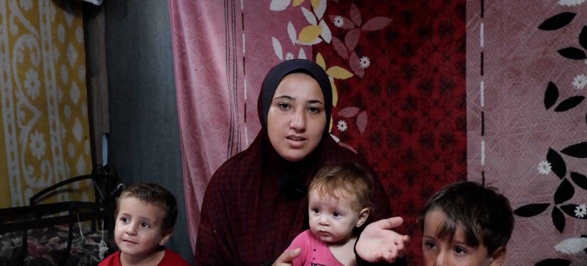 Norhan Shamlakh with her 3 kids in Deir El Balah, Gaza getting ready to go to a health center where her kids will receive polio vaccination. Norhan Shamlakh with her 3 kids in Deir El Balah, Gaza getting ready to go to a health center where her kids will receive polio vaccination.