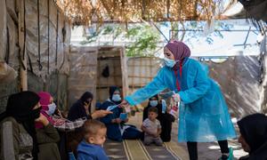 UNICEF staff conduct hygiene awareness sessions to communities in Lebanon to help stop the transmission of cholera.