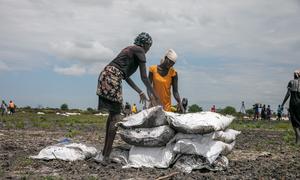 People from the local community receiving food supplies in Rupchai, Unity state, South Sudan.