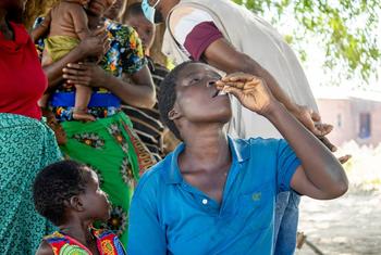 Daina Denja takes the cholera vaccine during UNICEF' cholera vaccine campaign at Misili village in Chikwawa district, Malawi.
