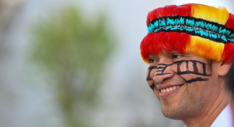 An indigenous community member attends the UN Climate Change Conference COP28 at Expo City in Dubai, United Arab Emirates.