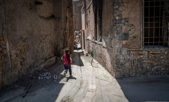 A child runs on a street in Mosul, Iraq. (file)