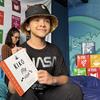 Iker, de 11 años, durante las actividades de lectura en voz alta del primer catálogo del Club de Lectura de los ODS capítulo México.