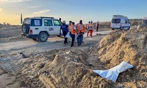 A body bag lies in a ditch following an airstrike at Tal Al Sultan, Rafah, Gaza. 