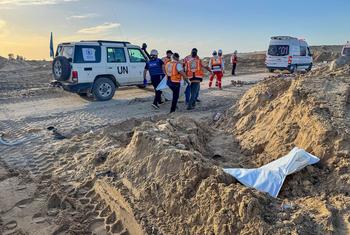 A body bag lies in a ditch following an airstrike at Tal Al Sultan, Rafah, Gaza. 