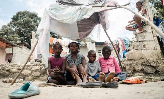 A mother sits with her children in an IDP site in Léogâne, on the outskirts of the Haitian capital, Port-au-Prince.