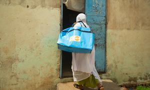 A midwife visiting pregnant women in a shelter for internally displaced persons in Sudan.