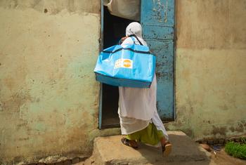 A midwife visiting pregnant women in a shelter for internally displaced persons in Sudan.