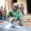 A young man learns welding through a UN-supported programme in Rwanda. (file)