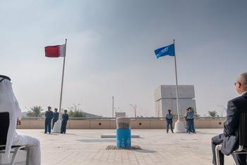 Flags of the United Nations and the State of Qatar fly at the Qatar National Convention Centre, the venue of the Second World Summit for Social Development.