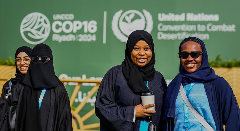 Delegates arrive on the first day of the COP16 desertification conference in Riyadh, Saudi Arabia.