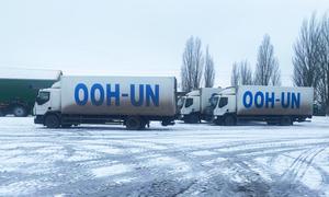 A convoy delivers aid to Dobropillia village in Ukraine's Zaporizhzhia region