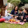 Thirteen-year-olds share a picnic of fresh fruit, tangerine muffins, cheese sticks and quince pie close to their school in Montevideo, Uruguay (file photo).