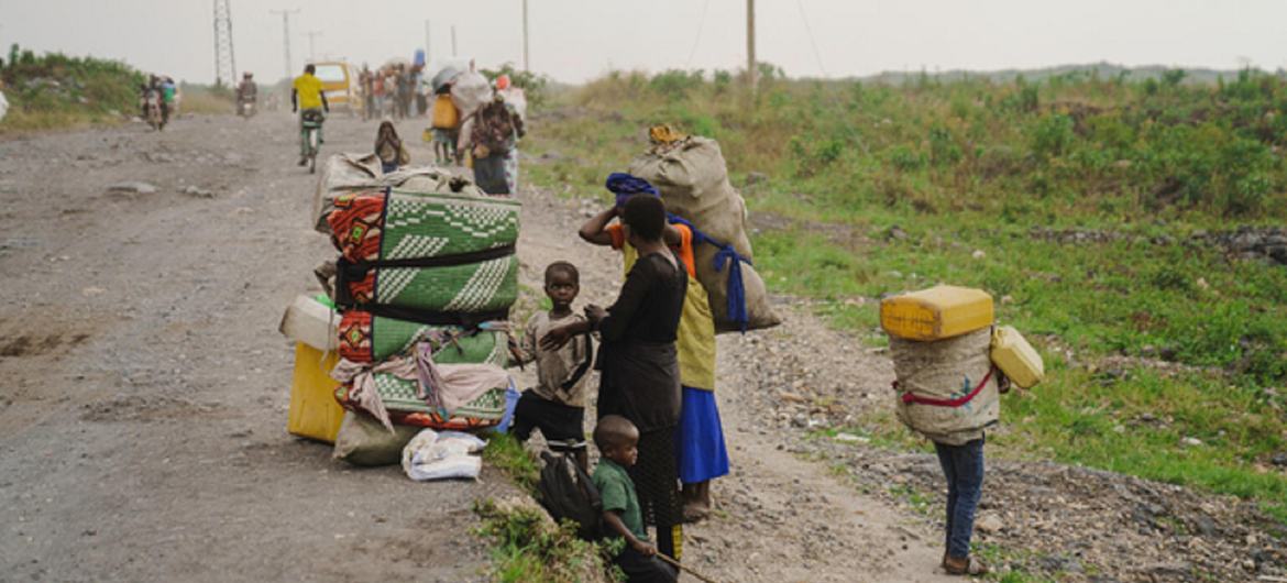 Vendors surrounded by garbage sell goods in Port-au-Prince, Haiti.
   

11 March 2025 Human Rights
