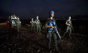 UN peacekeepers conduct a foot patrol along the Blue Line in southern Lebanon. 