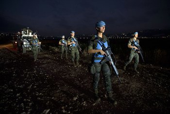 UN peacekeepers conduct a foot patrol along the Blue Line in southern Lebanon. 