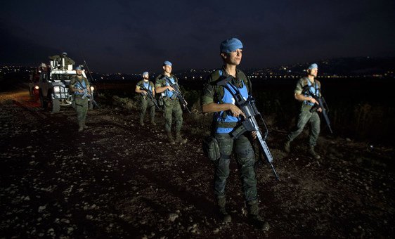 UN peacekeepers conduct a foot patrol along the Blue Line in southern Lebanon. 