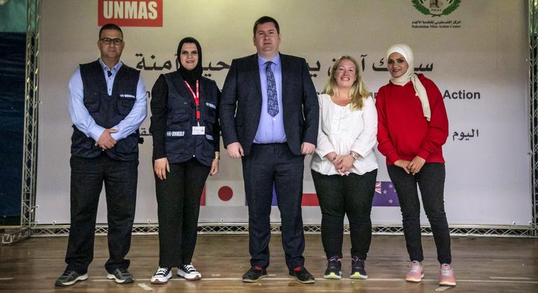 Charles Birch (centre), Head of UNMAS Palestine, with colleagues.