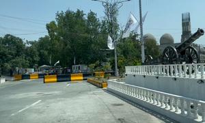 Flags of the de facto authorities outside Governor’s compound in Jalalabad, Afghanistan.