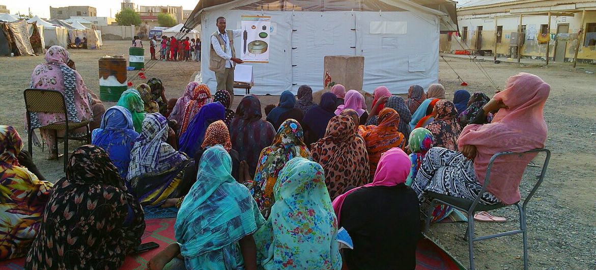 At a school in Port Sudan, an explosive ordnance risk education in conducted for internally displaced persons.