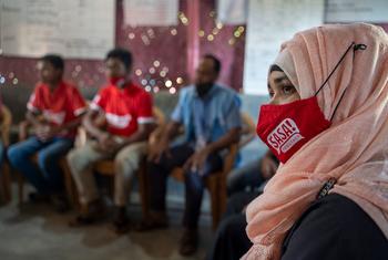 Rohingya refugee Hasina Begum and fellow community outreach volunteers attend a meeting with UNHCR staff about gender-based violence in Kutupalong refugee camp in Cox’s Bazar, Bangladesh.
