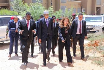 UNODC Executive Director Ghada Waly (second, right) at the opening of a court prison complex in Somalia.