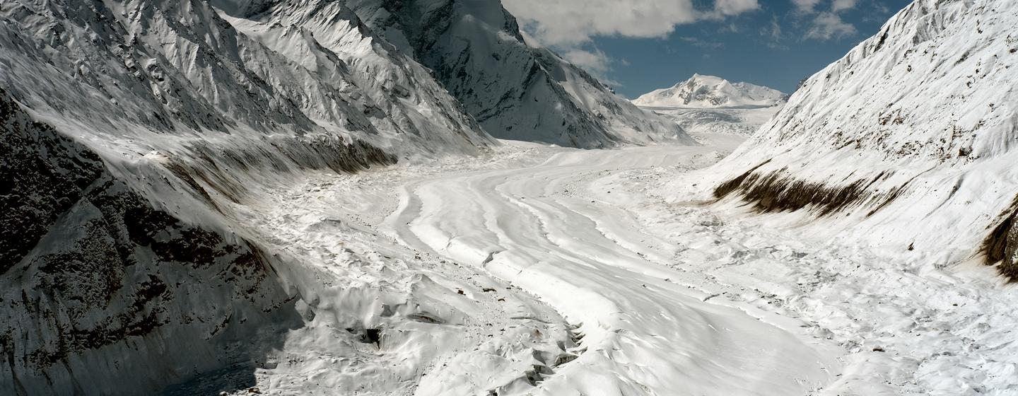 A mountain glacier that is shrinking due to rising temperatures and less snowfall at the Kargil District, India.