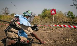 UNMAS worker detects an anti-tank mine, in Central Equatoria state, South Sudan.