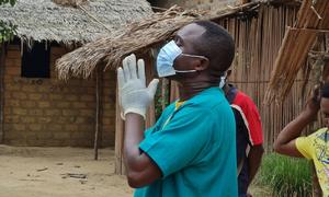 A health worker in Motema Pembe area prepares for a household decontamination in Mbandaka, Democratic Republic of the Congo.