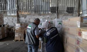 Health supplies are prepared for delivery in a warehouse in Gaza.