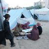 Internally displaced people rest at a camp near the Nasser Hospital in Khan Yunis, in the south of Gaza.